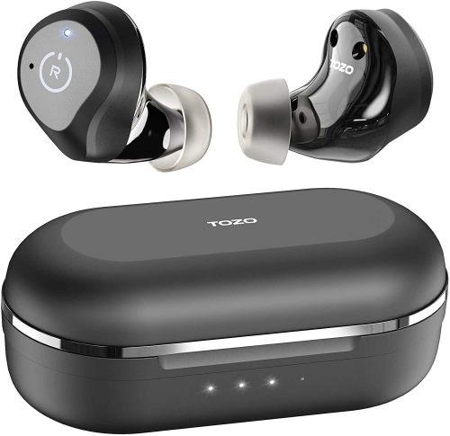 Gray Tozo earbuds suspended over carrying case